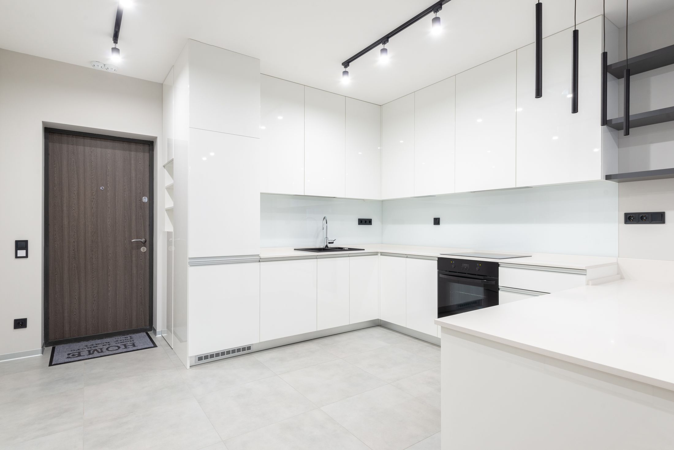 Bright white renovated kitchen with clean counters — stock interior photo